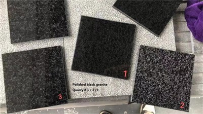 Tumedast graniidist diivanilaud