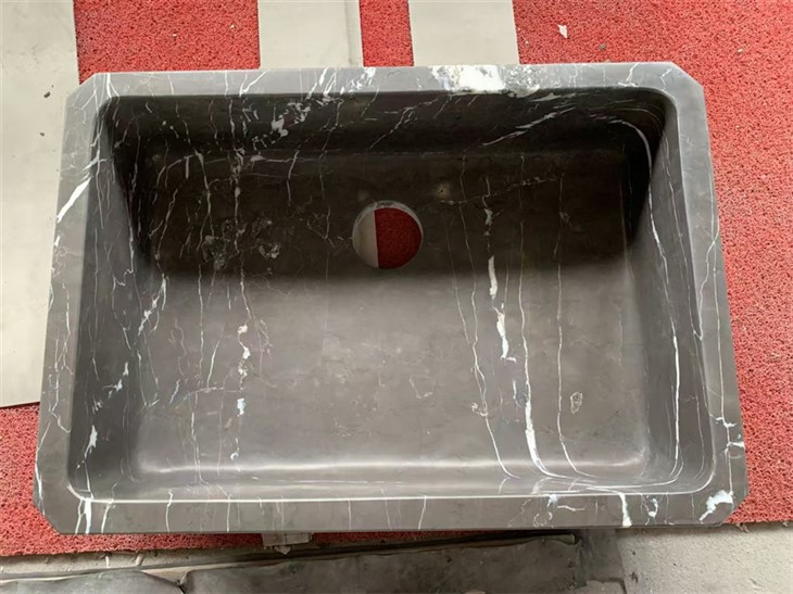 Marmorist valamu kraanikauss